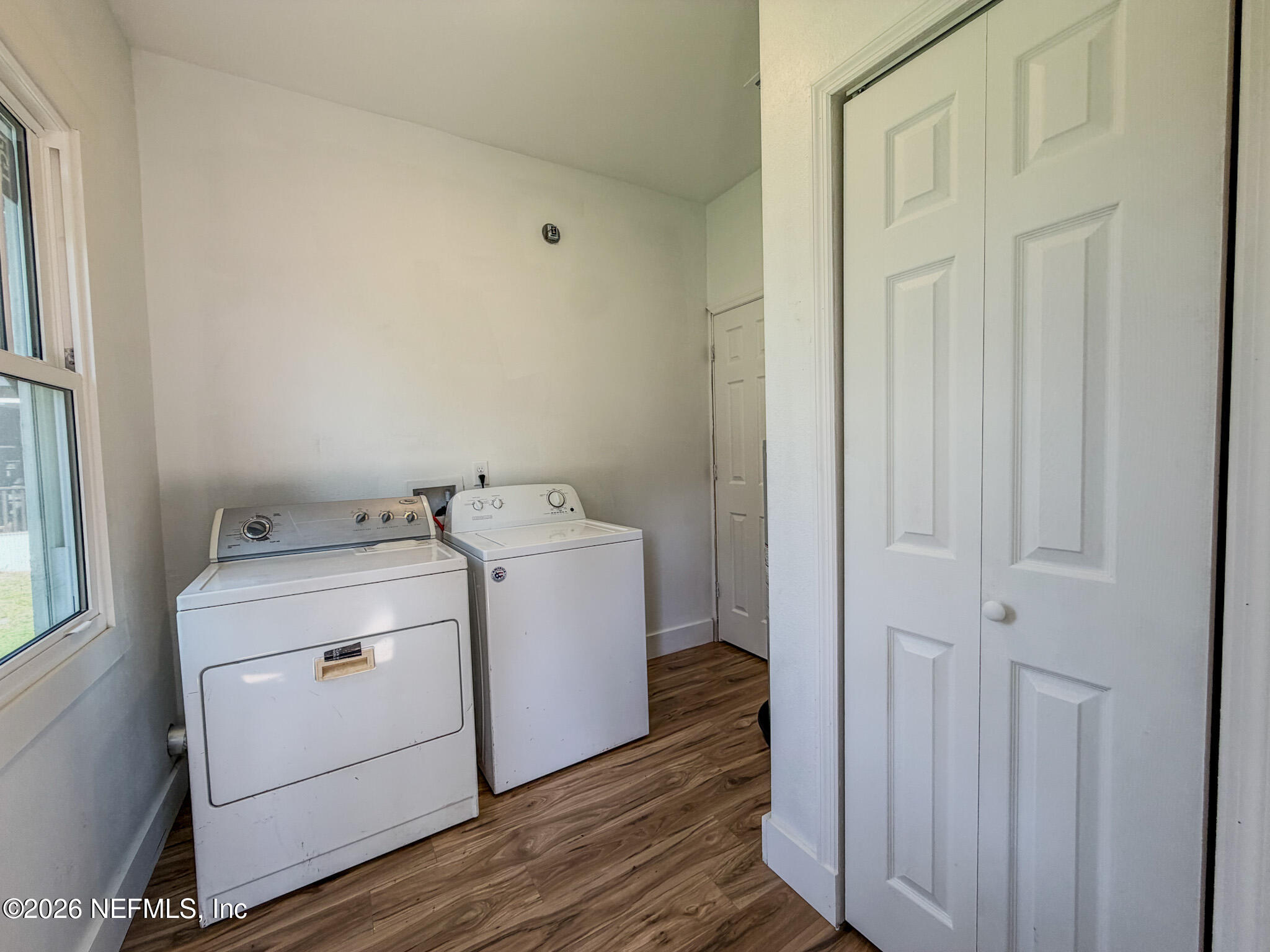 2589 Post Street Jacksonville, FL 32204 - Photo 19 of 19 a utility room with dryer and washer
