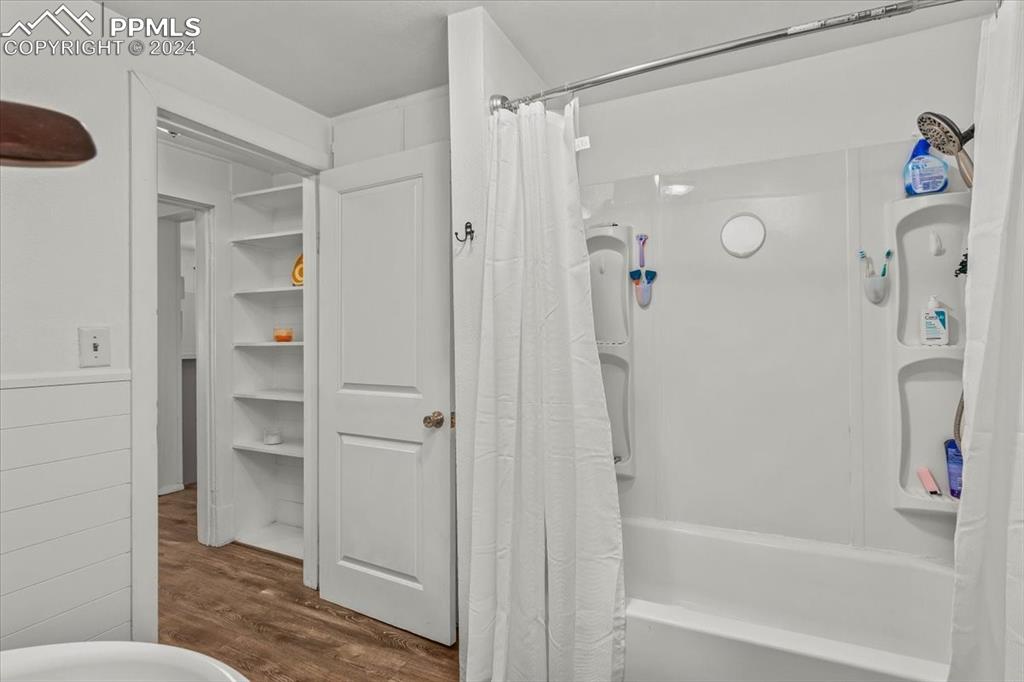 416 Wiley Avenue Swink, CO 81077 - Photo 20 of 43 a bathroom with a bathtub and a shower