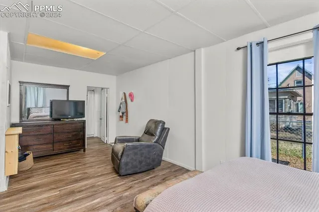 a room with furniture and a window