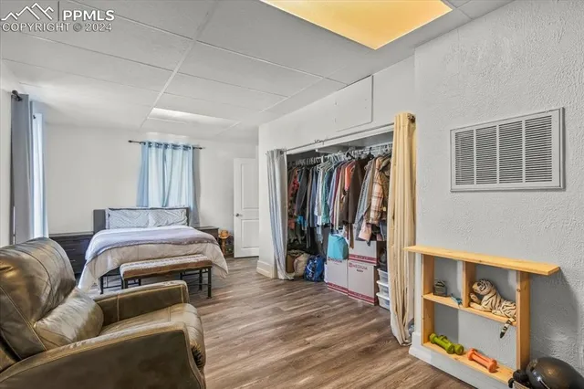 a bed room with furniture and a window