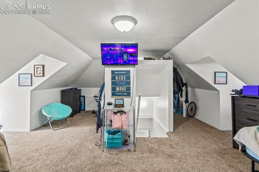 416 Wiley Avenue Swink, CO 81077 - Photo 25 of 43 a view of a room with gym equipment