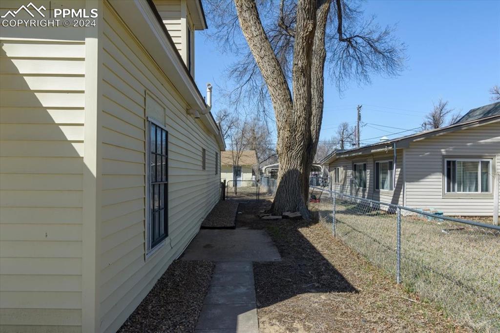 416 Wiley Avenue Swink, CO 81077 - Photo 39 of 43 a view of a house with a yard