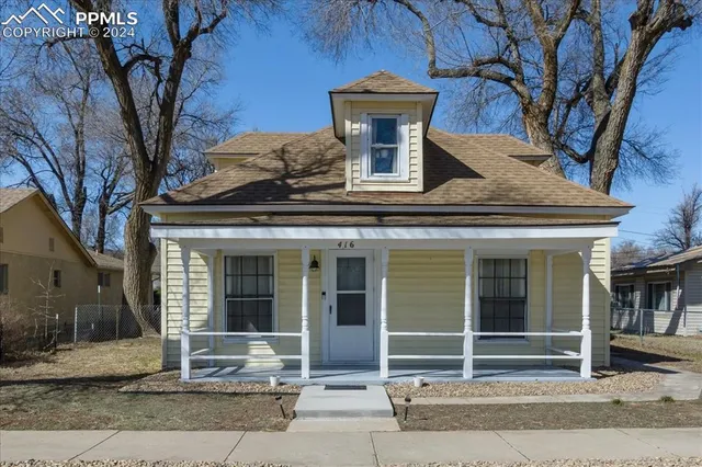 a view of house with outdoor space