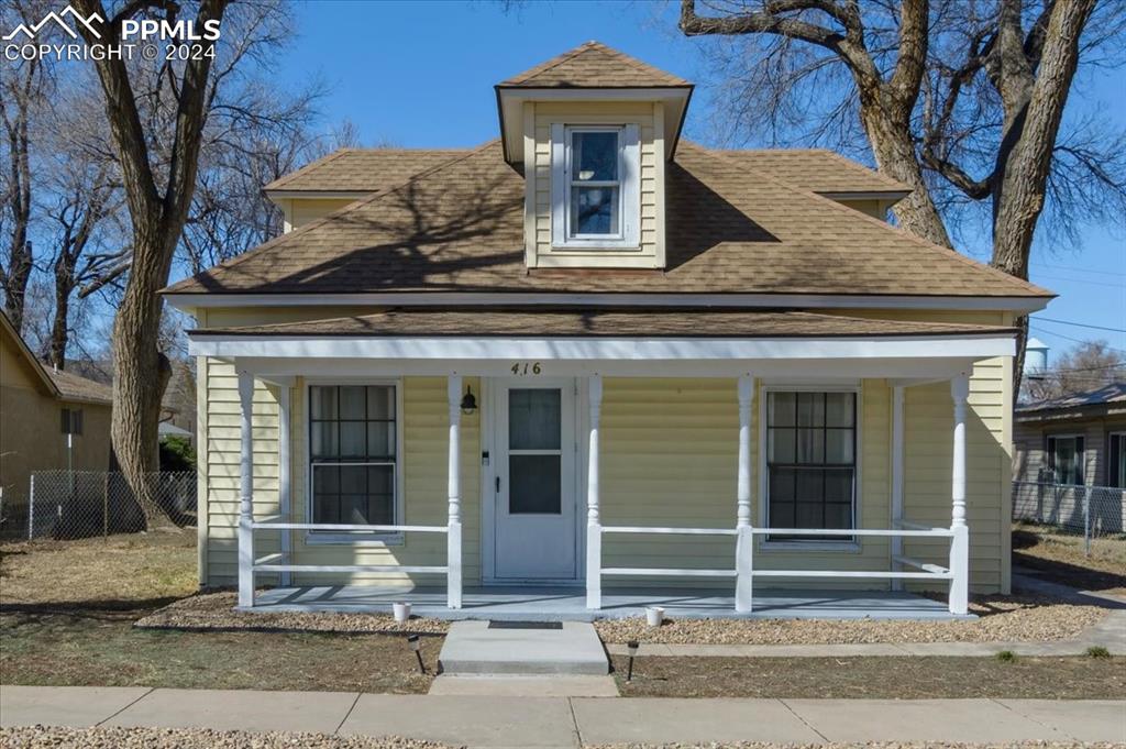416 Wiley Avenue Swink, CO 81077 - Photo 43 of 43 a view of a building with a entryway door front of house