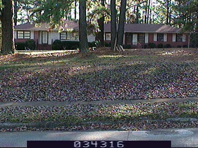 440 Millbrook Road Raleigh, NC 27609 - Photo 1 of 1 a view of a yard with a large tree