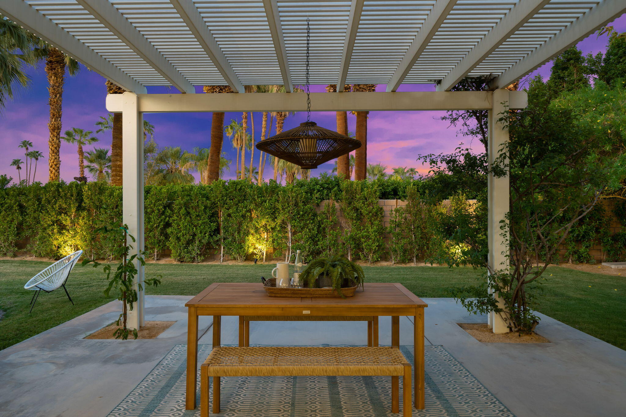 71540 Halgar Road Rancho Mirage, CA 92270 - Photo 12 of 51 a view of a chairs and table in patio with a barbeque