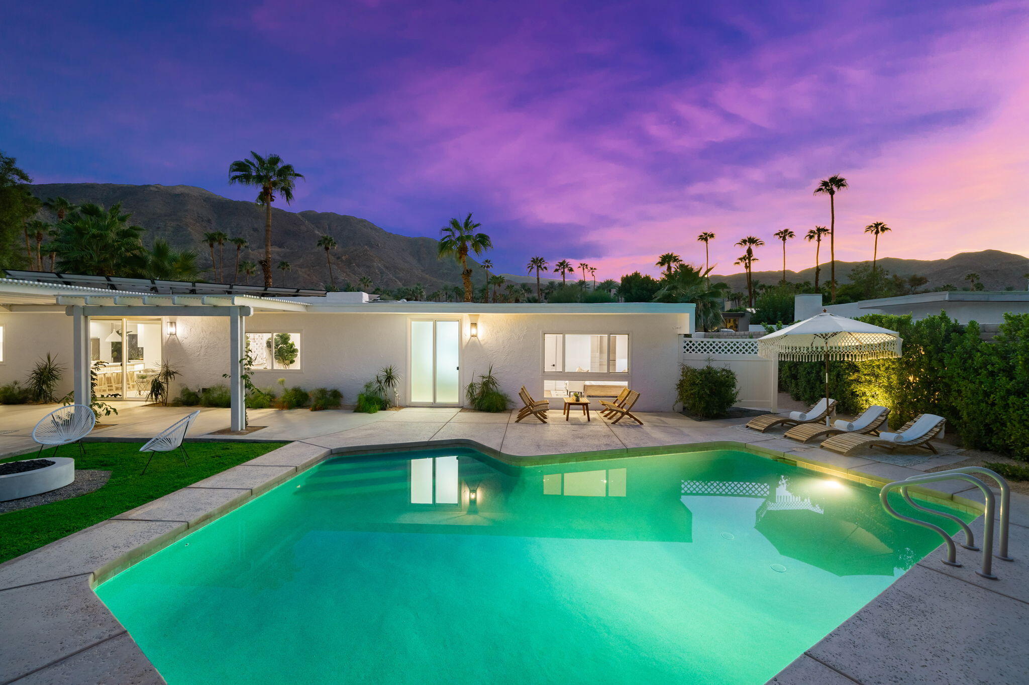 71540 Halgar Road Rancho Mirage, CA 92270 - Photo 20 of 51 a view of a house with garden and a yard
