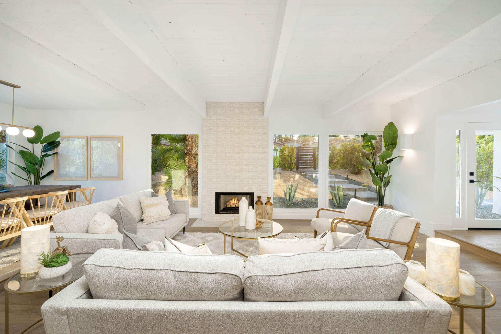 71540 Halgar Road Rancho Mirage, CA 92270 - Photo 23 of 51 a living room with furniture and a large window