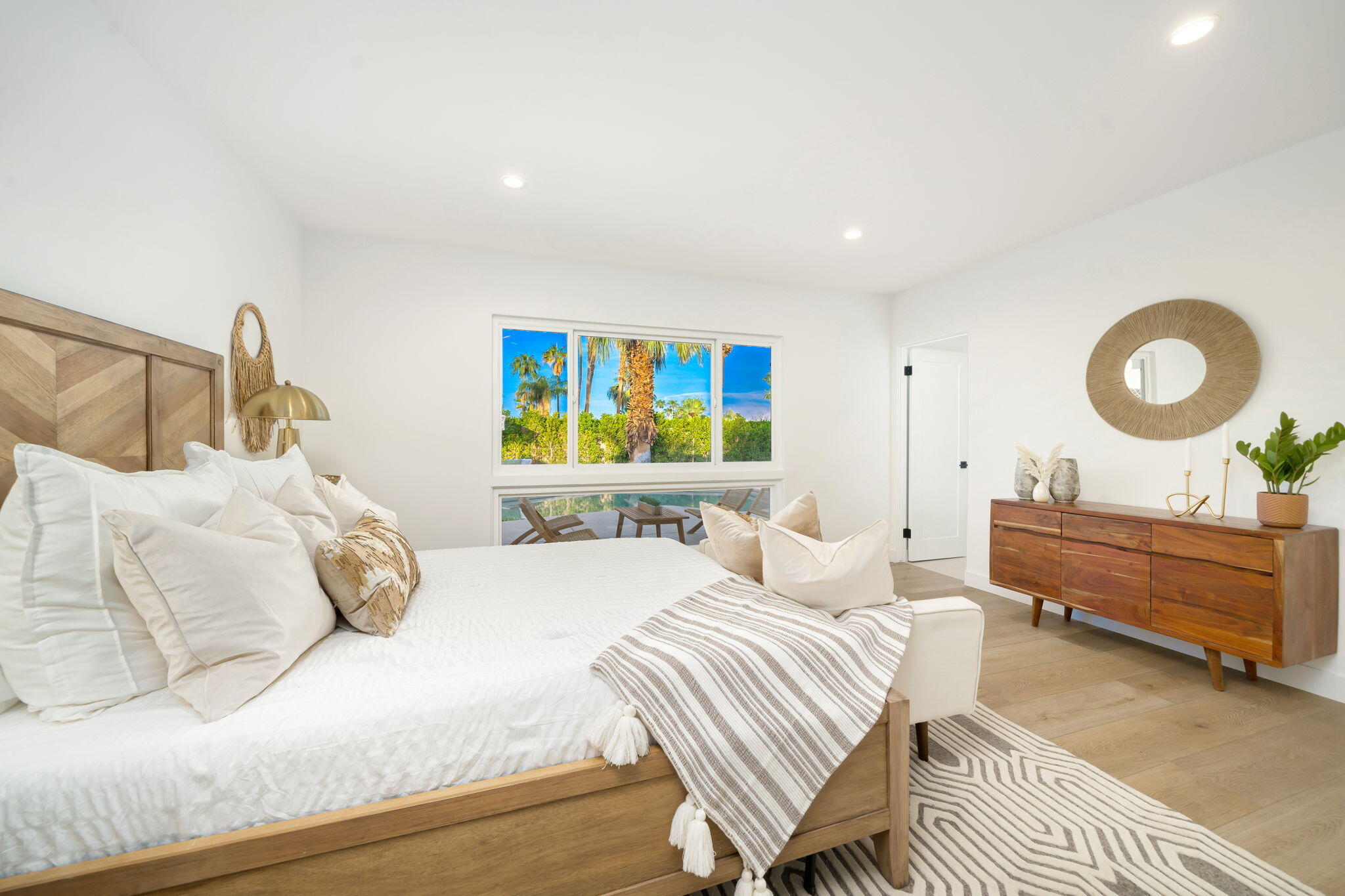 71540 Halgar Road Rancho Mirage, CA 92270 - Photo 32 of 51 a bedroom with a bed and window