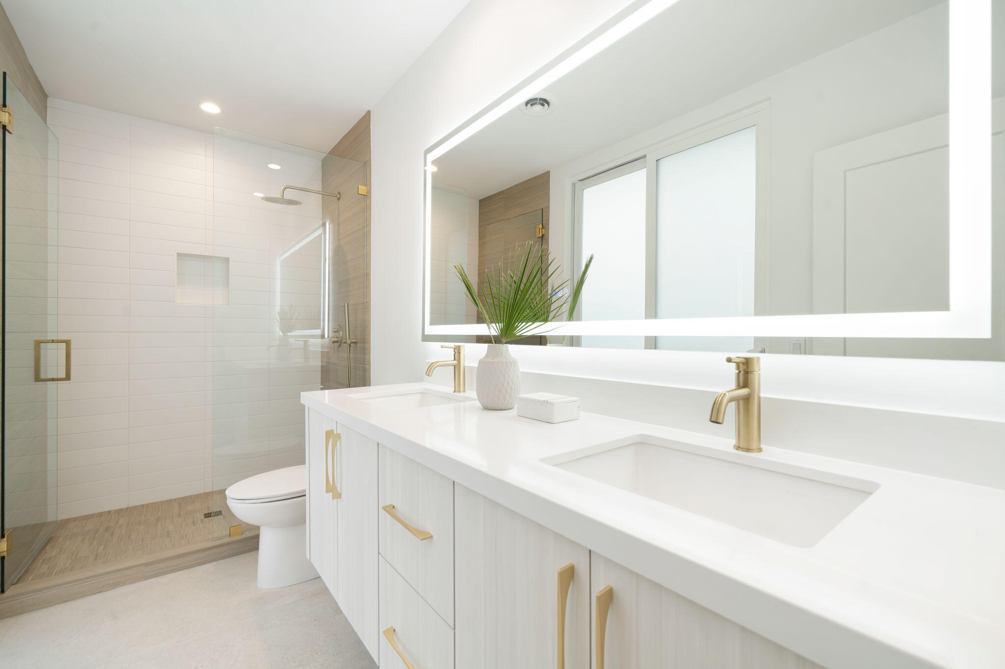 71540 Halgar Road Rancho Mirage, CA 92270 - Photo 34 of 51 a bathroom with a sink a toilet and a mirror