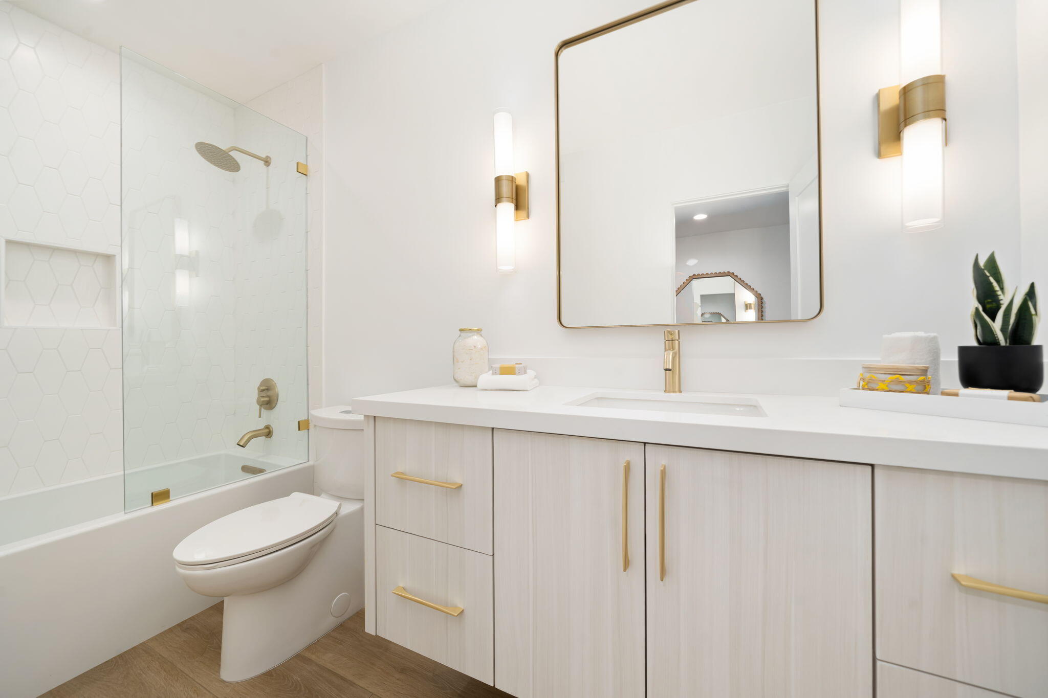 71540 Halgar Road Rancho Mirage, CA 92270 - Photo 35 of 51 a bathroom with a toilet a sink a tub and mirror