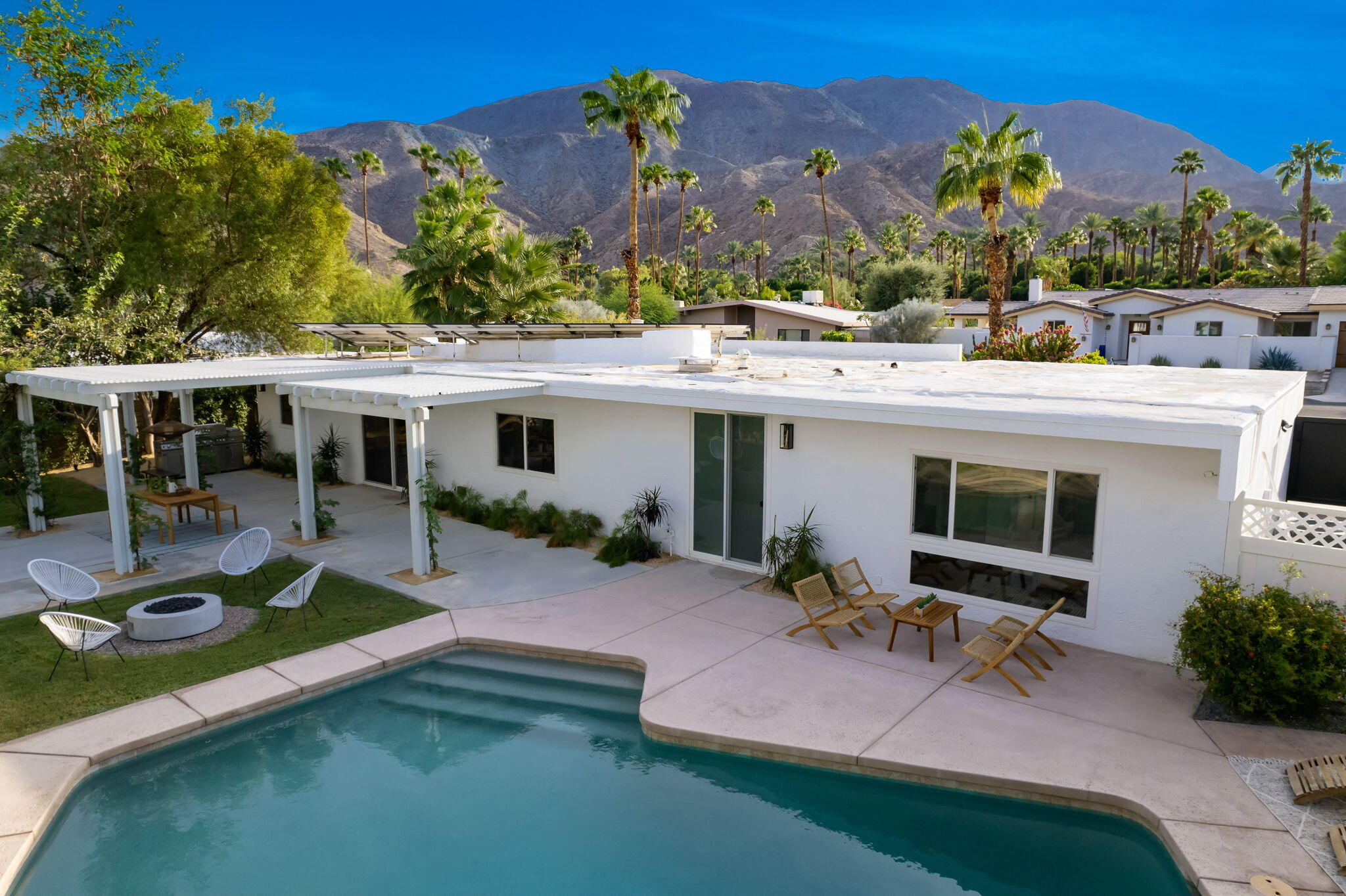71540 Halgar Road Rancho Mirage, CA 92270 - Photo 39 of 51 a view of a house with backyard porch and sitting area