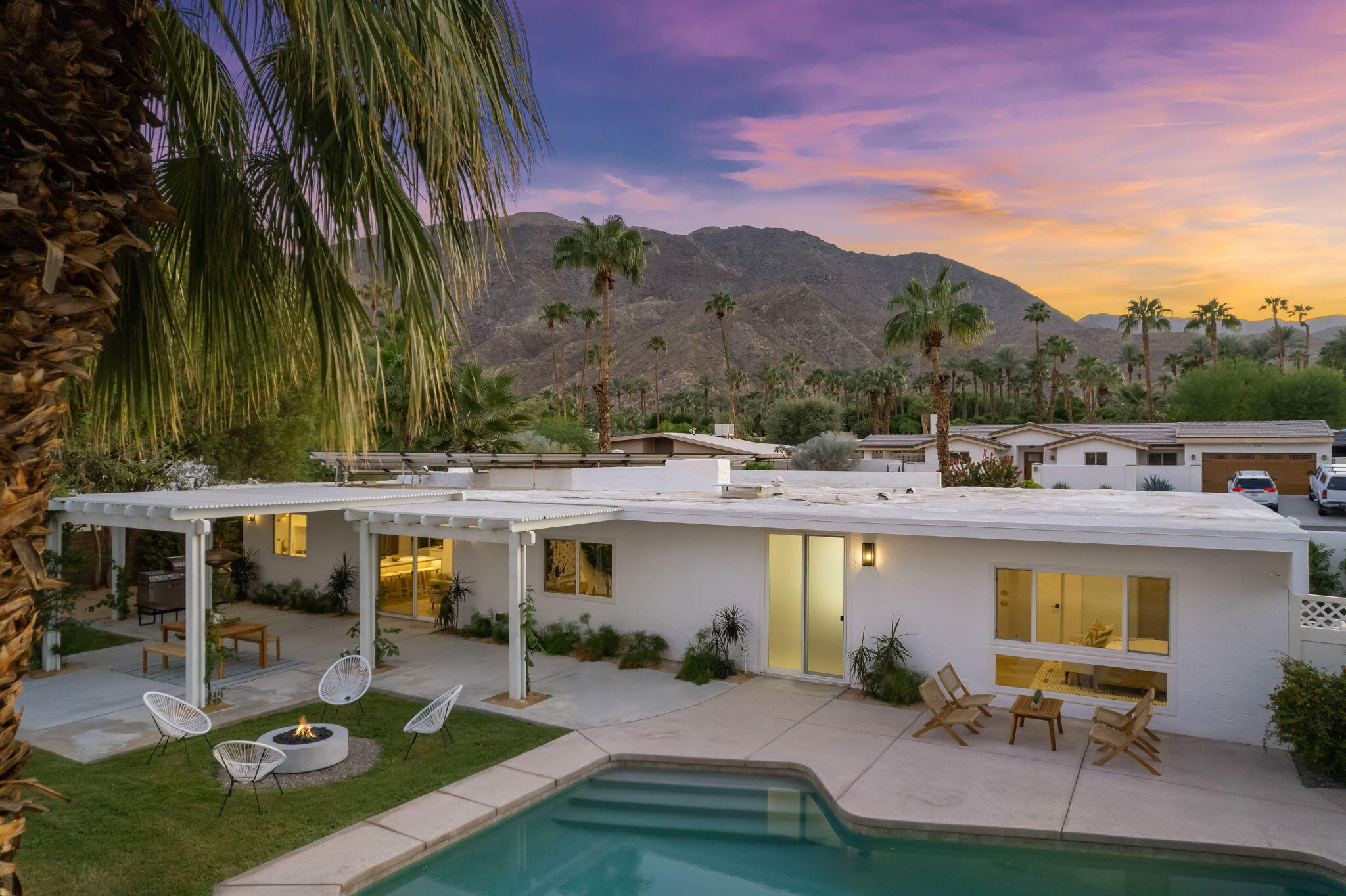 71540 Halgar Road Rancho Mirage, CA 92270 - Photo 5 of 51 a front view of a house with garden
