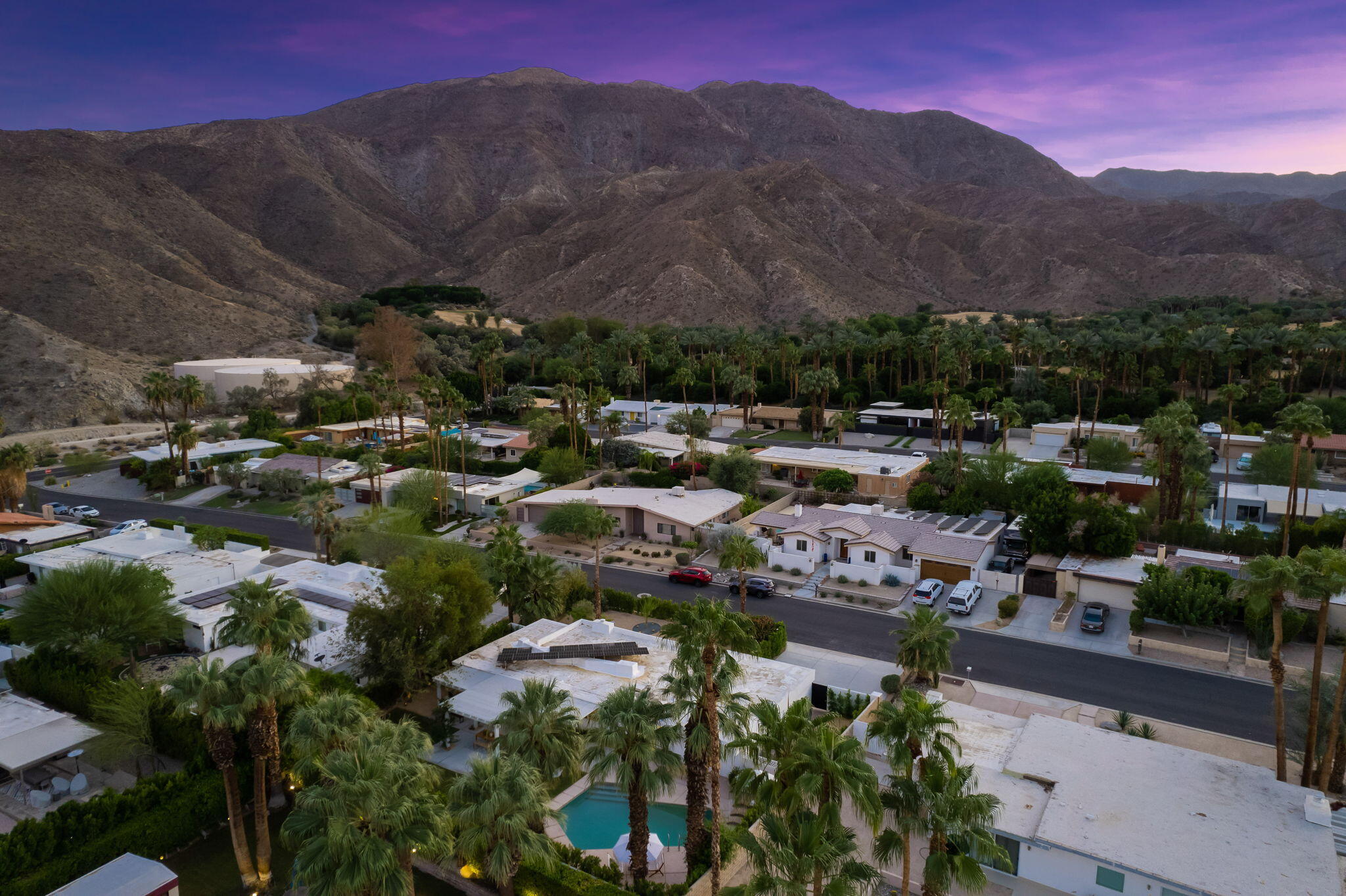 71540 Halgar Road Rancho Mirage, CA 92270 - Photo 6 of 51 a view of a city with lots of residential buildings and mountain view