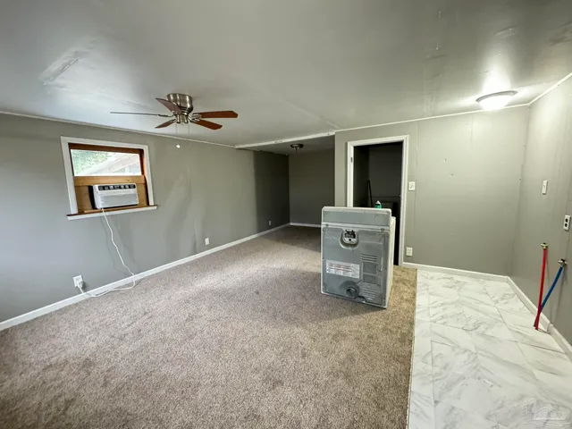 a view of a livingroom with a staircase