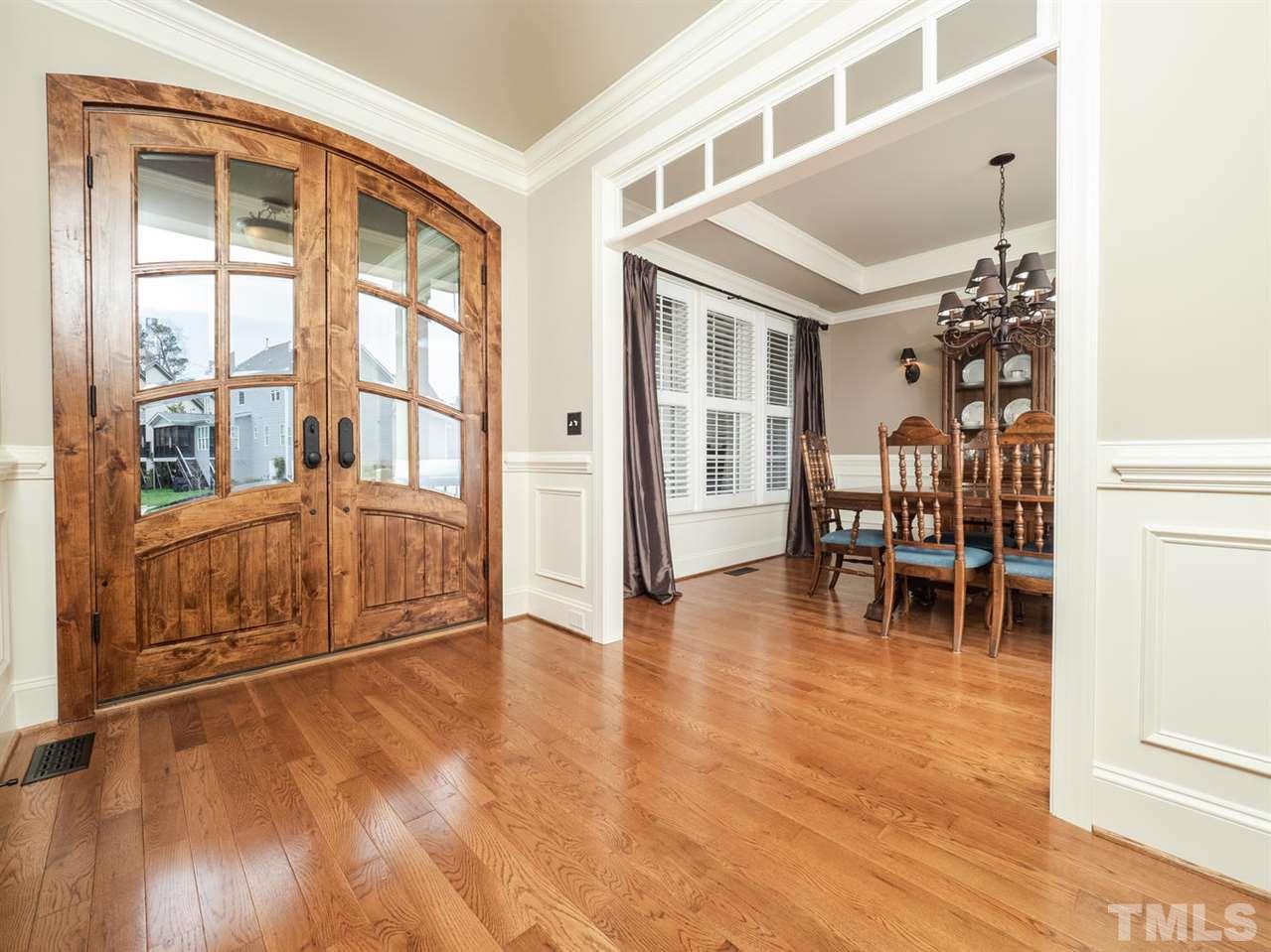 12804 Pegasi Way Raleigh, NC 27614 - Photo 3 of 30 a view of empty room with furniture and floor to ceiling window