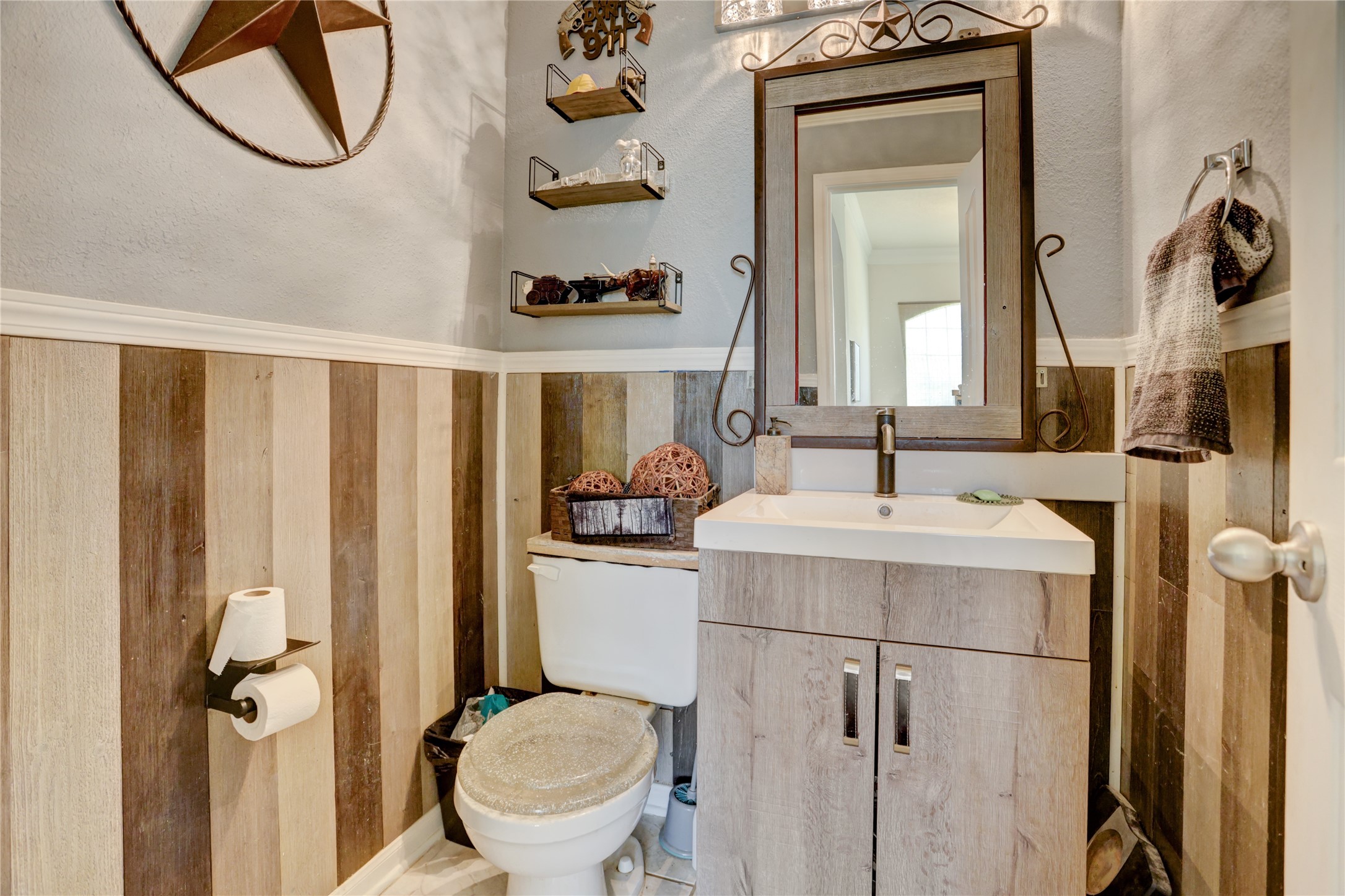 7022 Treaschwig Road Spring, TX 77373 - Photo 15 of 18 a bathroom with a sink toilet and shower