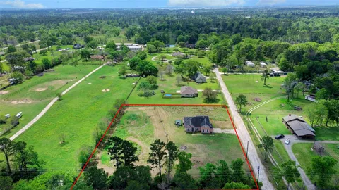 a view of a golf course with a park