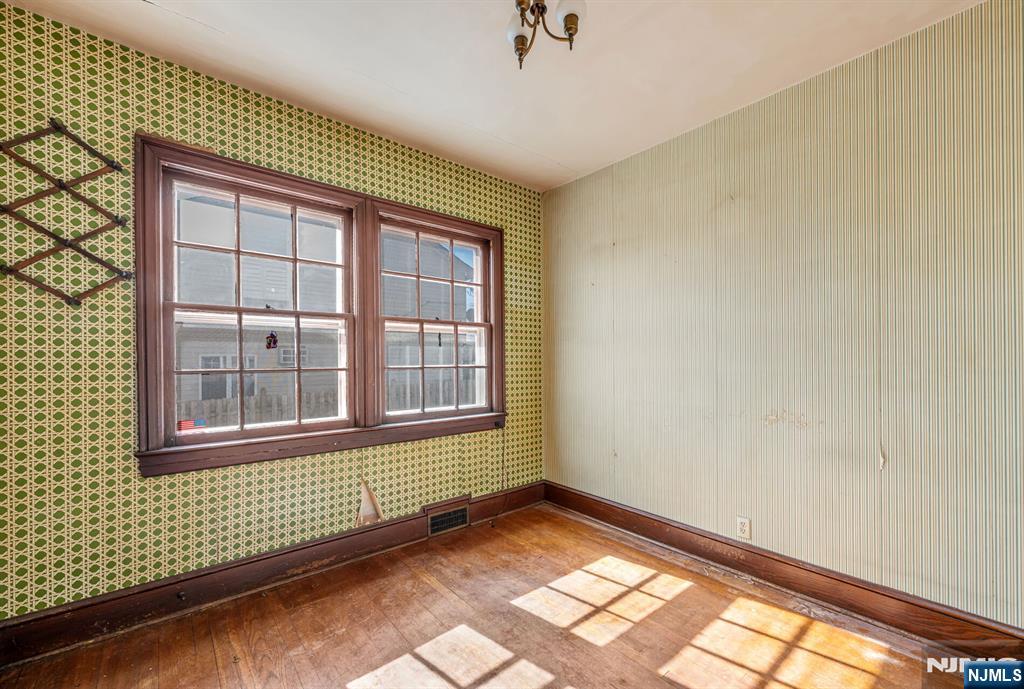 164 Chestnut Street Garfield, NJ 07026 - Photo 10 of 20 a view of an empty room and a window