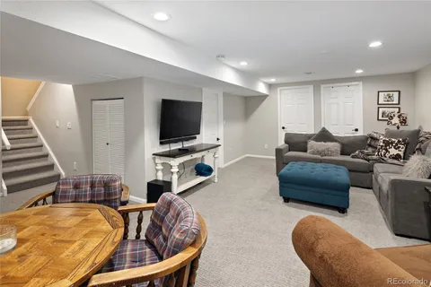 a view of a house and a deck