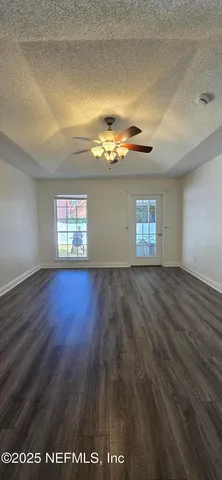 a view of bathroom with a sink and shower