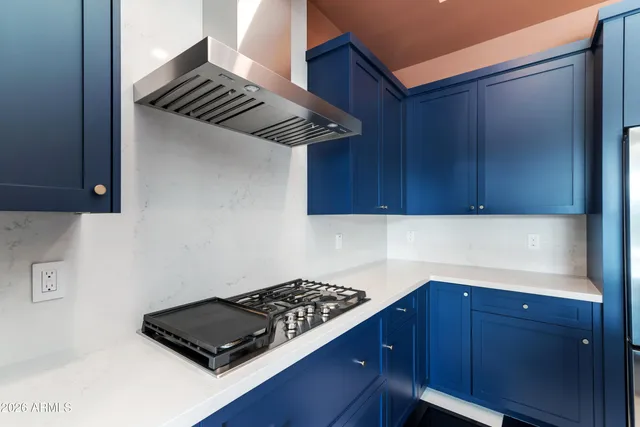 a room with a black white checkered floor with a black white checkered floor