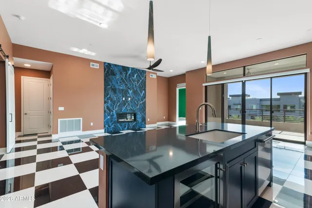 a kitchen with wooden cabinets and a stove top oven