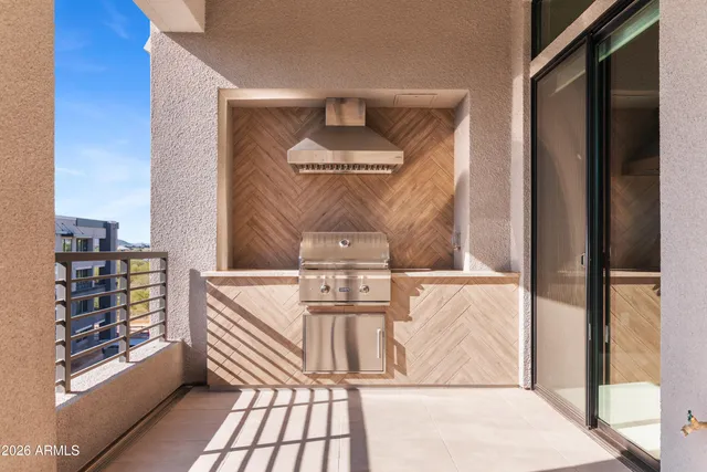 a view of a balcony with city view