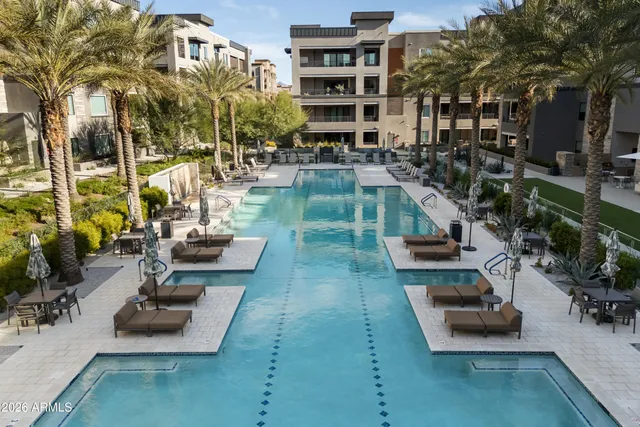 a front view of a house with many windows