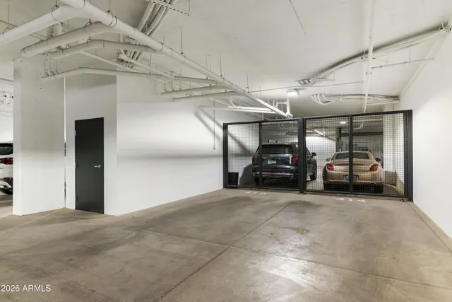 a view of a swimming pool with outdoor seating and plants