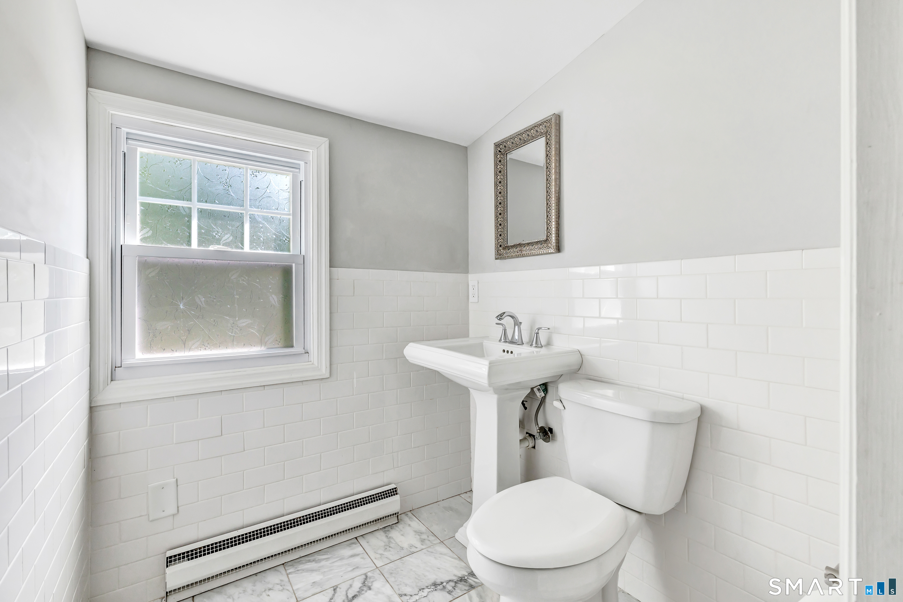 2082 Stratfield Road Fairfield, CT 06825 - Photo 23 of 37 Half Bathroom Upper Level