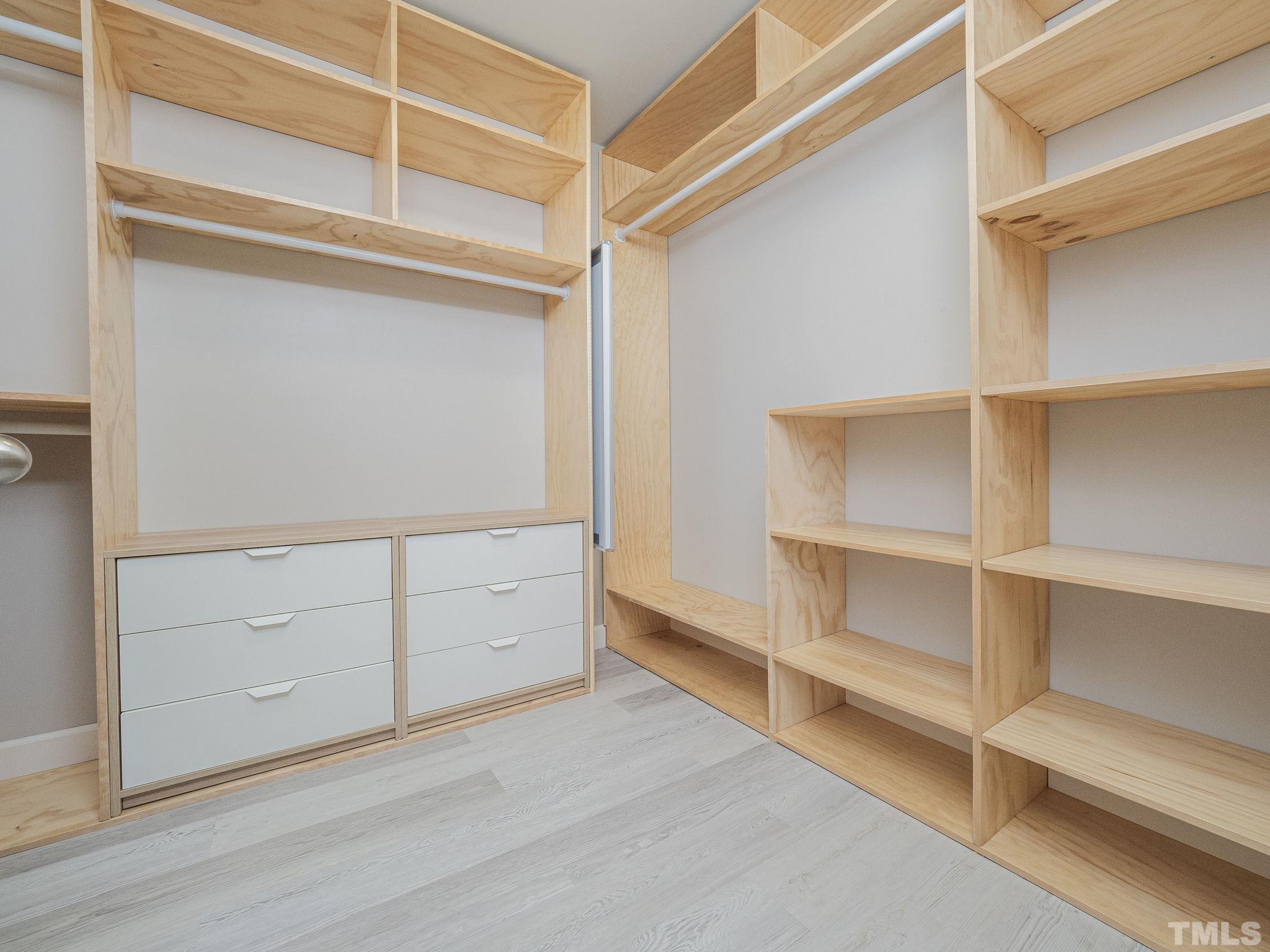 7435 Randshire Way Raleigh, NC 27616 - Photo 22 of 25 a view of an empty walk in closet