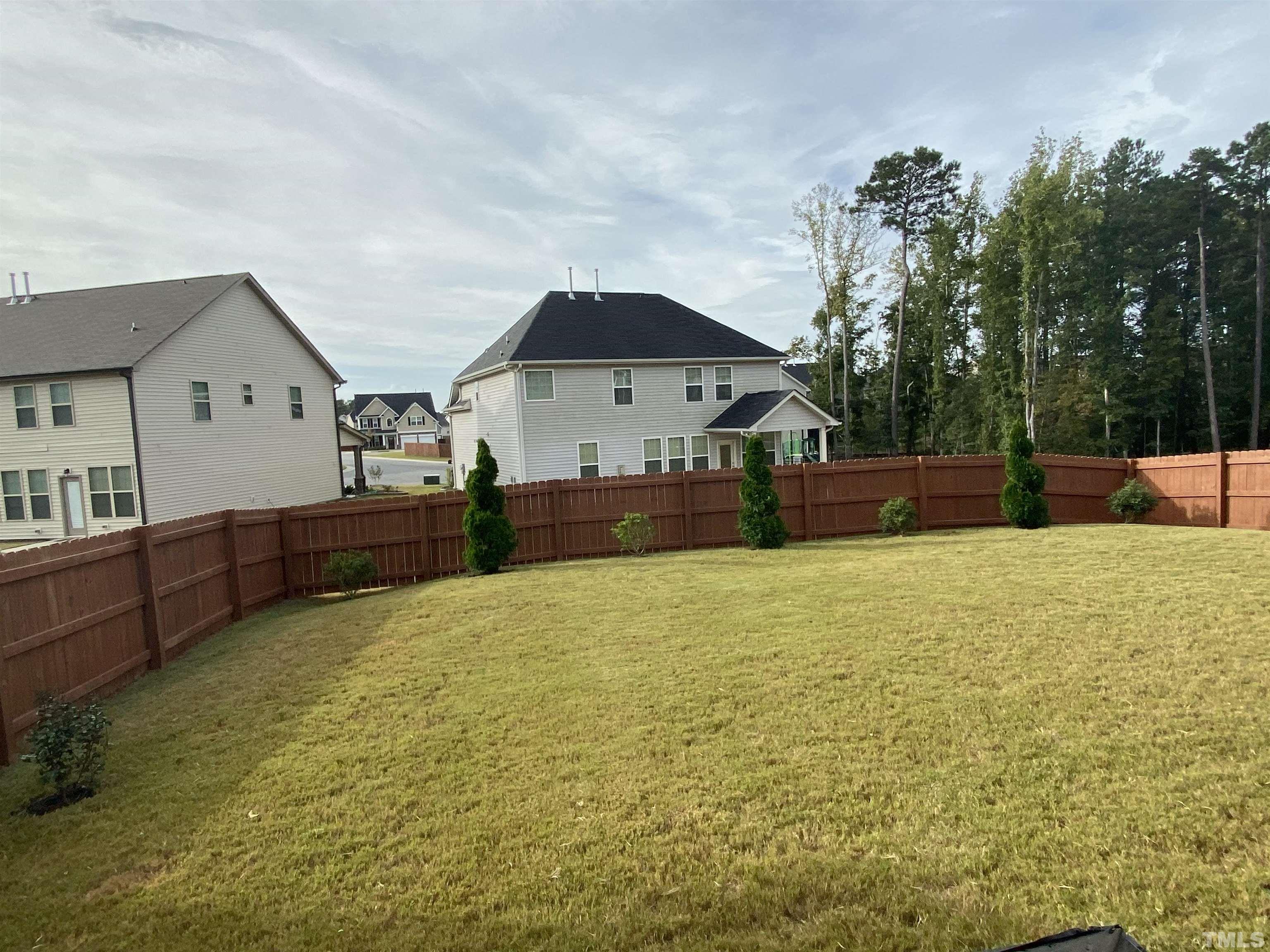 7435 Randshire Way Raleigh, NC 27616 - Photo 5 of 25 a swimming pool view with a outdoor space