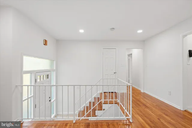 a kitchen with stainless steel appliances granite countertop a refrigerator and a stove