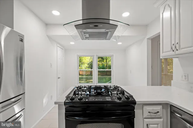 a view of a hallway with a white door