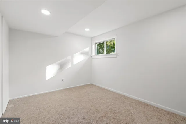 a bathroom with a sink a mirror and a shower