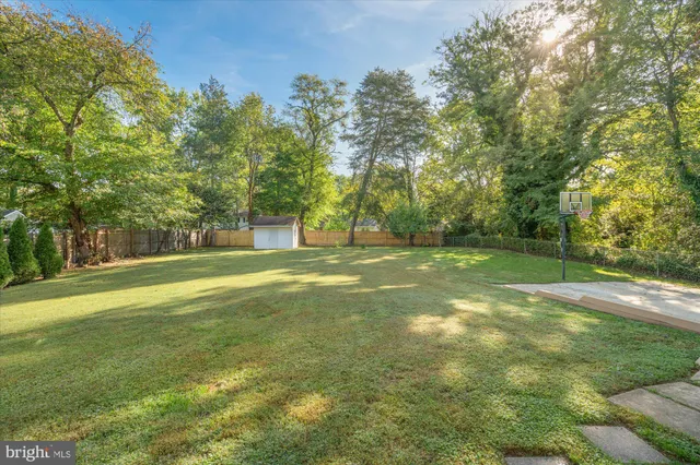 a view of a house with a big yard