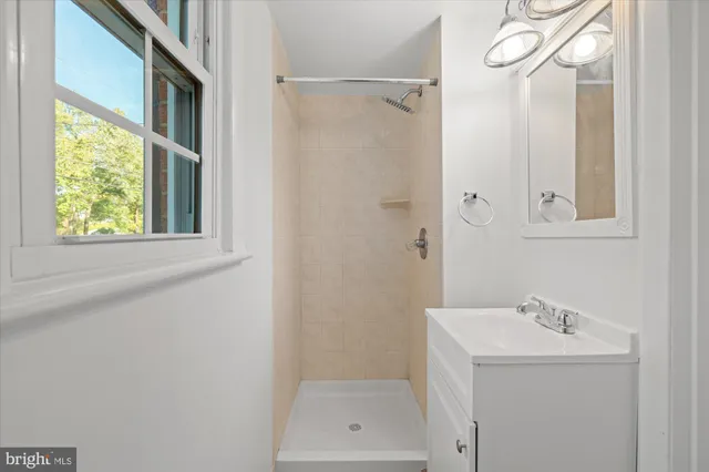 a view of a chairs and table in a backyard