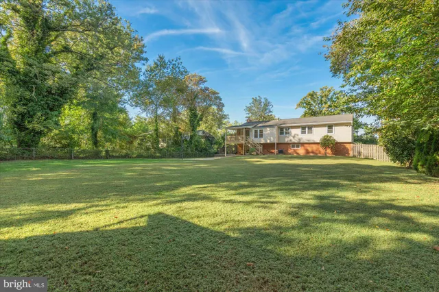 a view of a house with a big yard