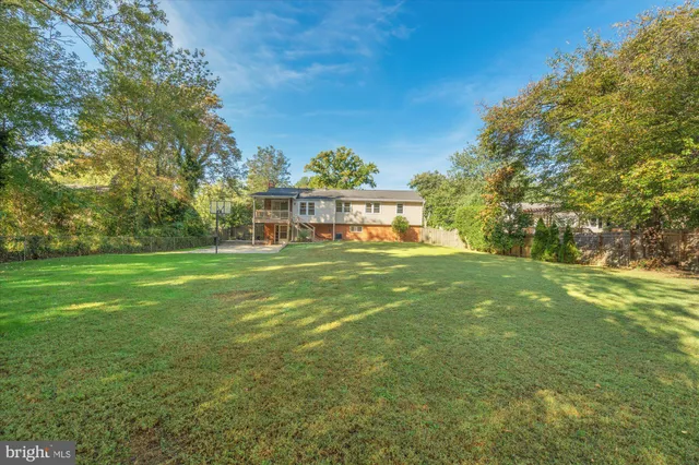 a view of a balcony with wooden floor