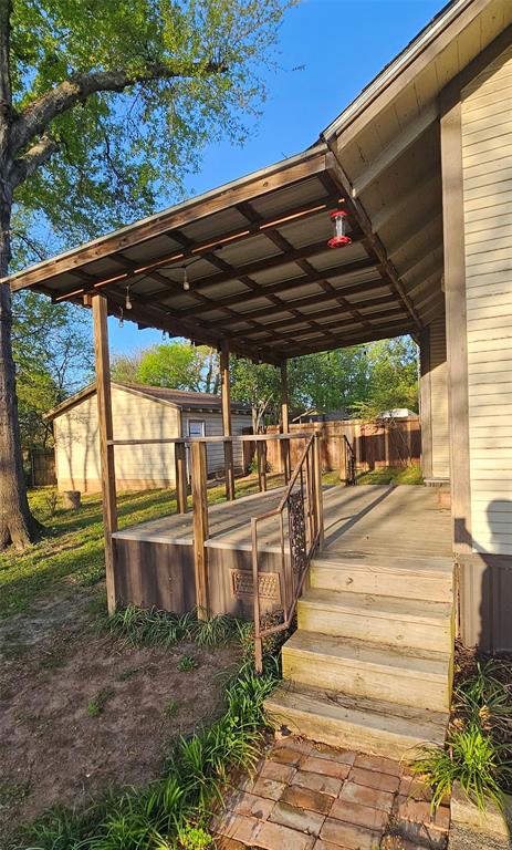 700 Live Oak Road Canton, TX 75103 - Photo 21 of 28 a view of a patio with wooden floor