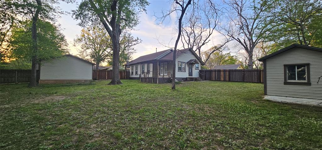 700 Live Oak Road Canton, TX 75103 - Photo 27 of 28 a view of a house with a yard