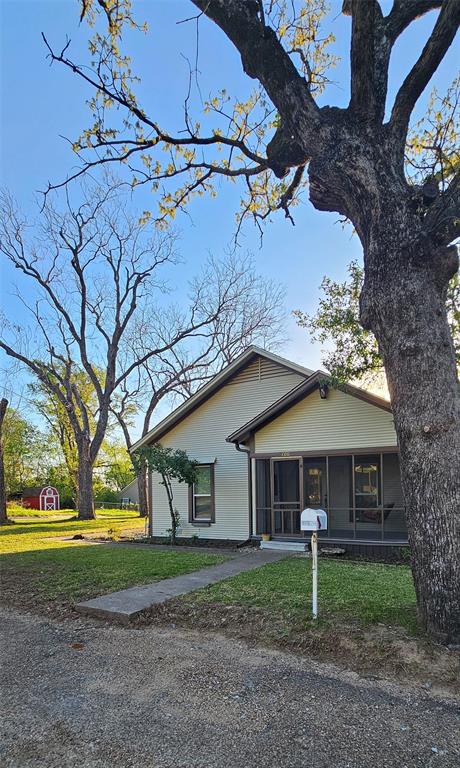 700 Live Oak Road Canton, TX 75103 - Photo 28 of 28 a view of a house with a yard