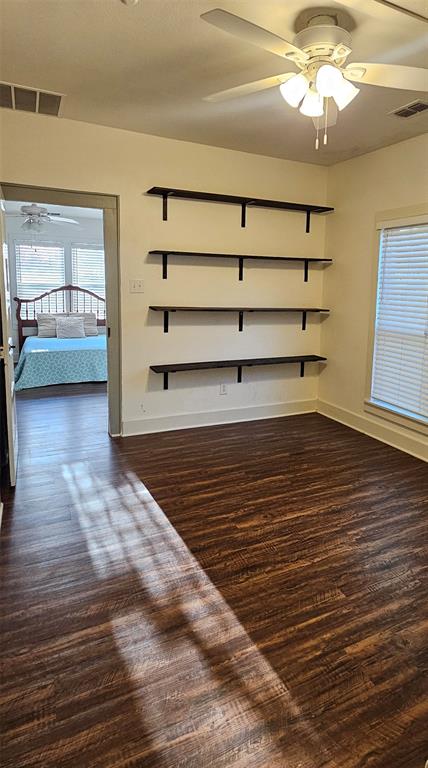 700 Live Oak Road Canton, TX 75103 - Photo 9 of 28 a view of a room with rack and wooden floor