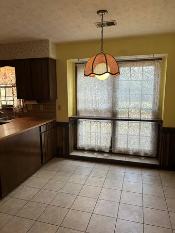 a view of a livingroom with a window