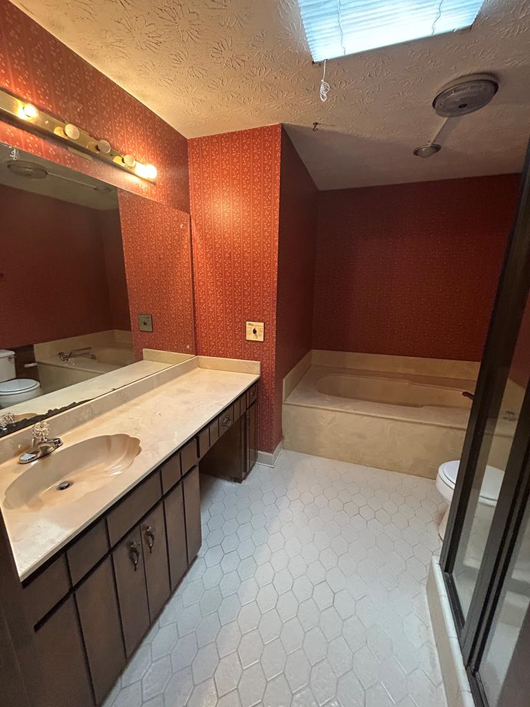 4032 Pickering Drive Columbus, GA 31907 - Photo 24 of 35 a bathroom with a sink and a mirror