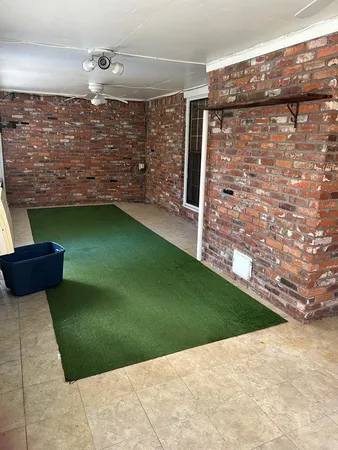 a view of backyard with outdoor space