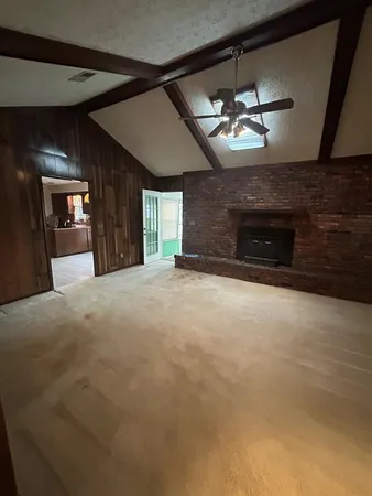 a kitchen with stainless steel appliances granite countertop a sink counter space and cabinets
