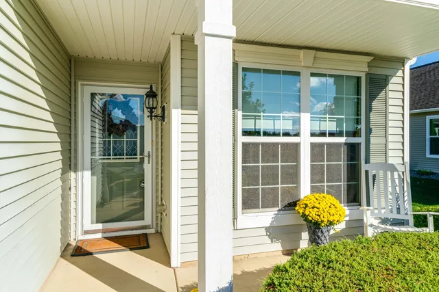 a view of a door and chair