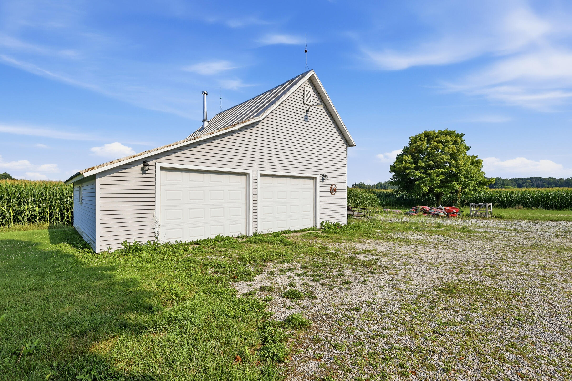9817 Old 151 Road Manitowoc Rapids, WI 54220 - Photo 21 of 27 Garage w/storage loft